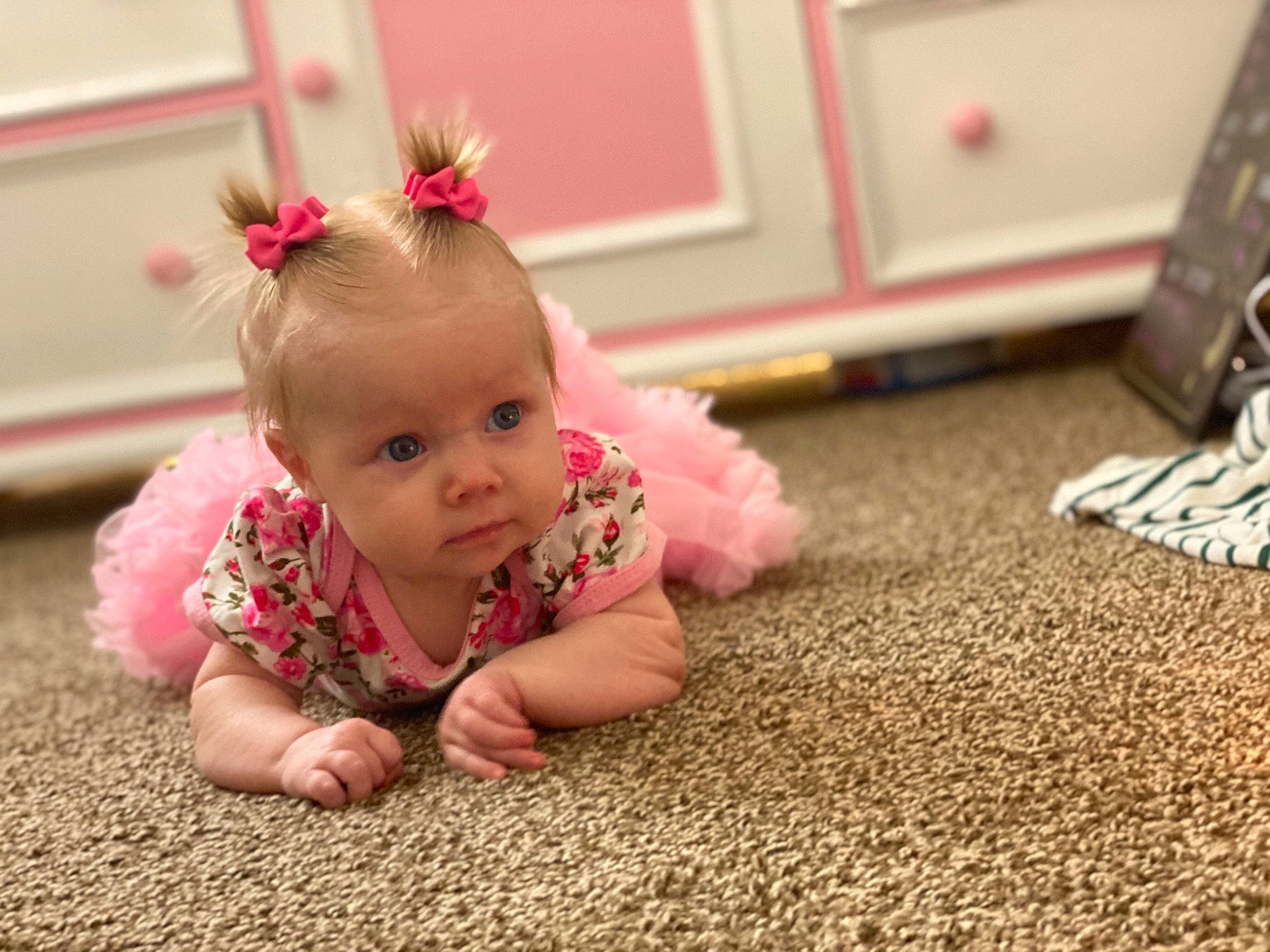 Gracie joined the competition — help win amazing prizes! baby, baby_toddler_clothing, carpet, cheek, child, crawling, ear, floor, flooring, head, person, pink, play, room, shoe, sitting, skin, smile, toddler, tummy_time