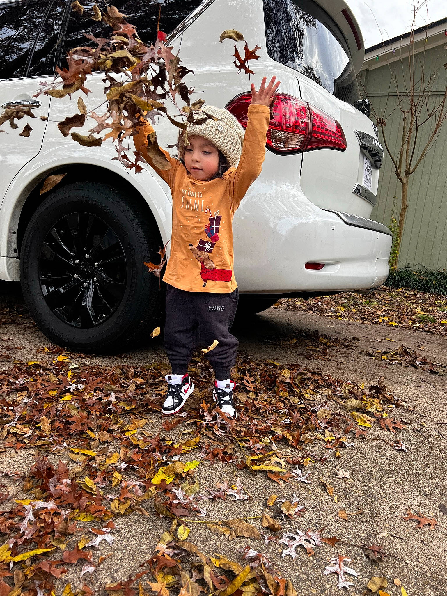 Juliet is registered to the contest to win money with this photo: alloy_wheel, asphalt, automotive_design, automotive_exterior, automotive_lighting, automotive_tire, bumper, car, headwear, hood, leaf, motor_vehicle, person, rim, rolling, street_fashion, tints_and_shades, tire, vehicle, vehicle_door