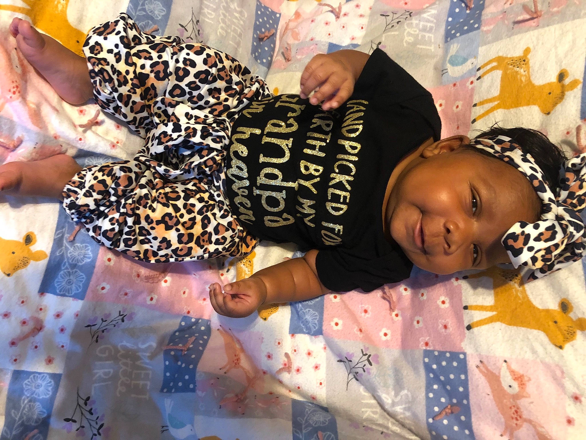 Adalynne is registered to the contest to win money with this photo: baby_toddler_clothing, blurred, hair_accessory, headpiece, headwear, human, pattern, person