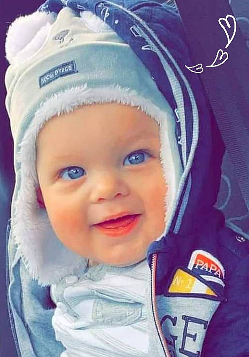 Nolhan participe au concours pour gagner de l'argent avec cette photo : azure, baby, cap, cheek, cloud, eye, eyebrow, face, facial_expression, happy, head, headwear, iris, nose, organ, outerwear, person, product, skin, smile