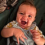 baby, child, smiling, happy, face, hands, overalls, clothing, stroller, seatbelt, infant, cute, joyful, motion_blur, portrait, indoor, person, expression, young_child, closeup