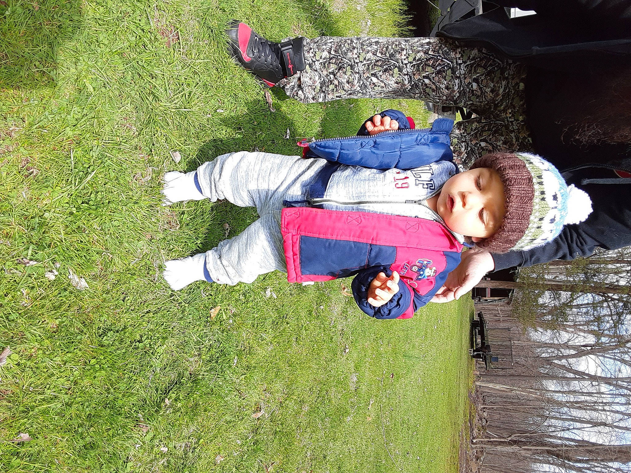 Tyrion is registered to the contest to win money with this photo: child, fun, grass, headwear, leisure, nap, person, plant, play, toddler, tree, vacation