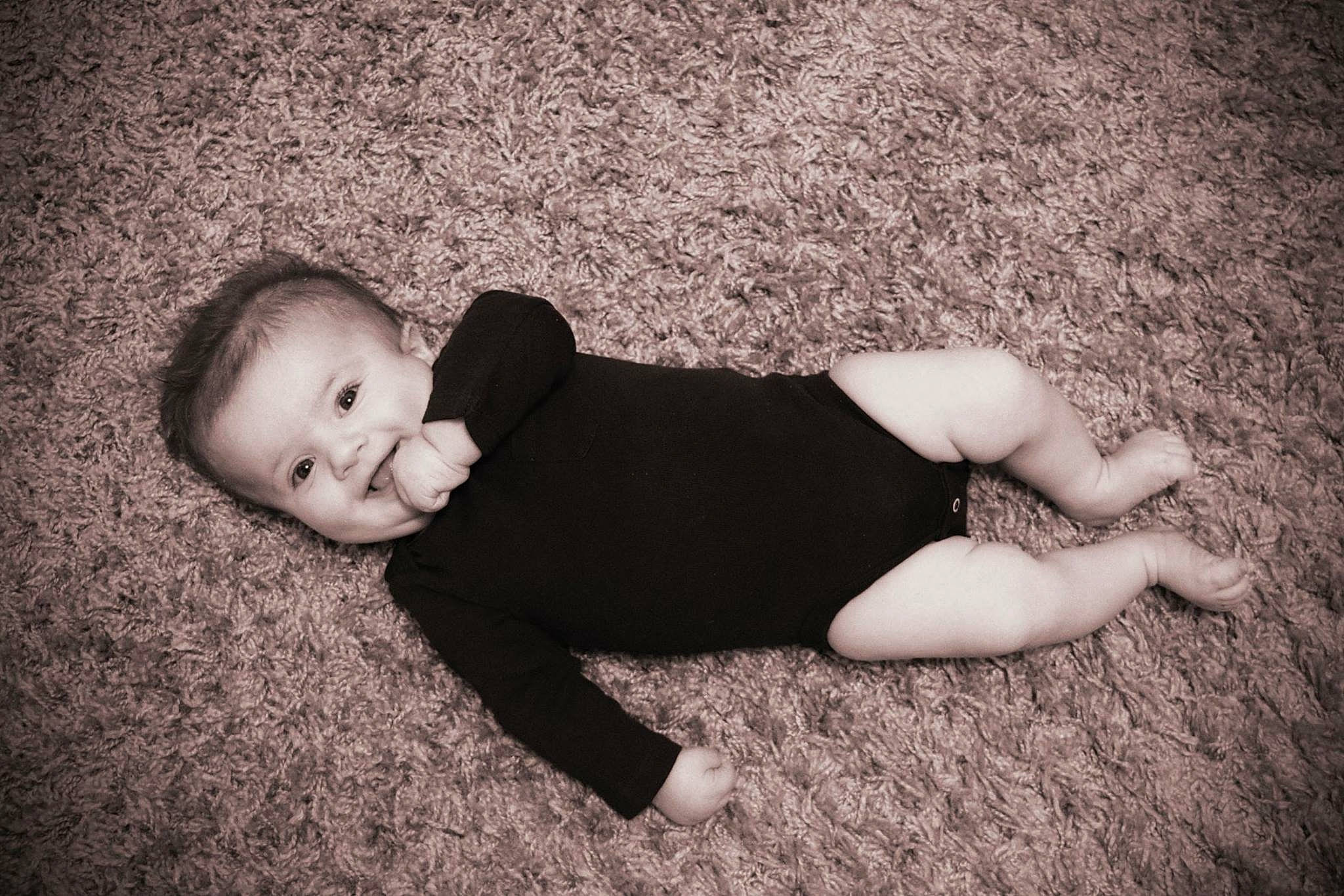 Deacon is registered to the contest to win money with this photo: baby, beauty, black, black_and_white, cheek, child, eye, flash_photography, floor, flooring, head, joy, leg, lip, monochrome, monochrome_photography, person, photograph, photography, skin