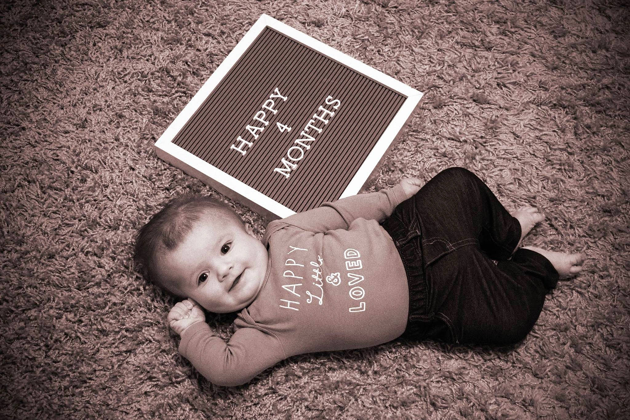 Deacon is registered to the contest to win money with this photo: baby, black, black_and_white, child, font, person, photograph, photography, text, toddler