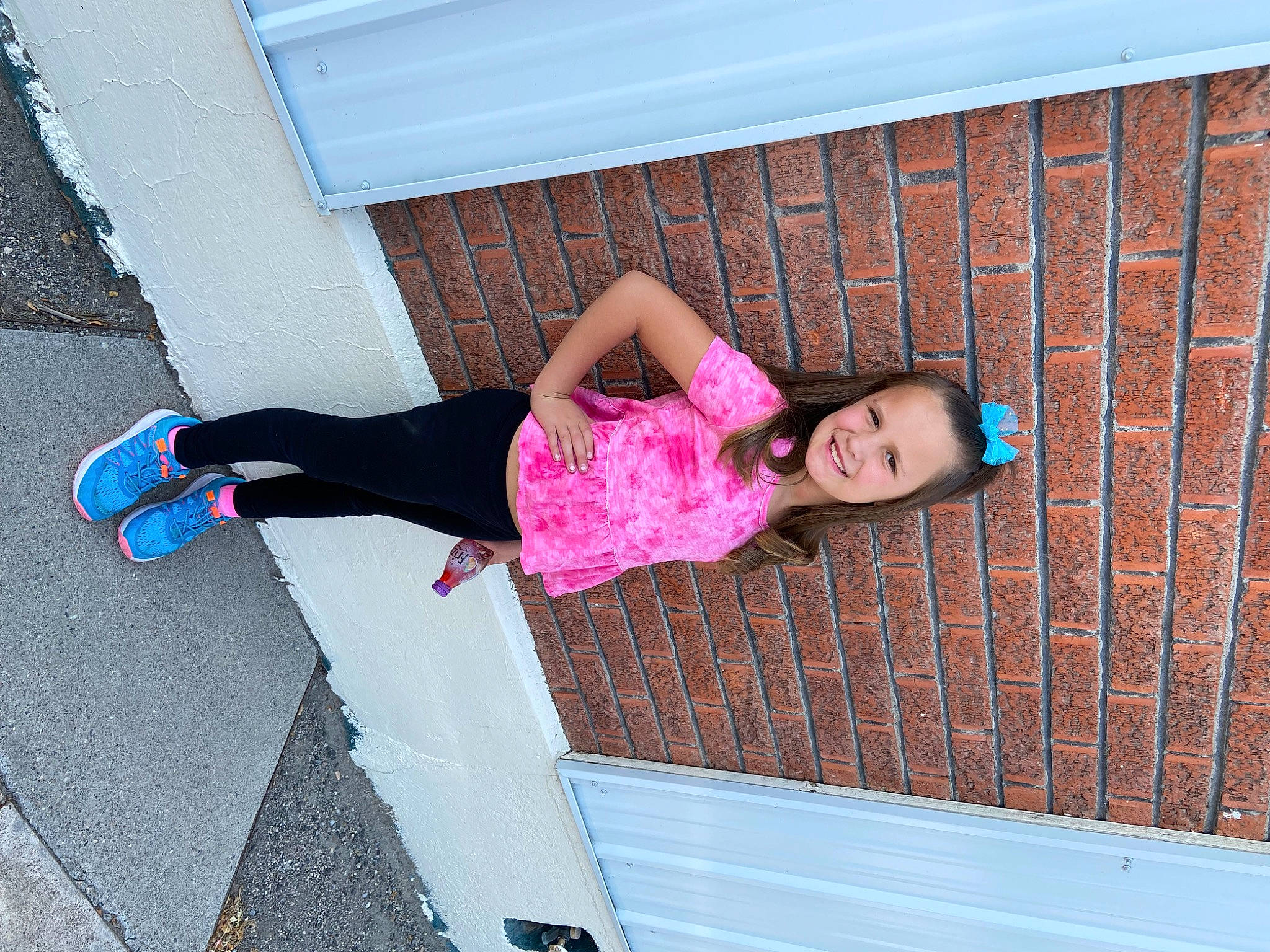 Kenzie joined the competition — help win amazing prizes! blue, child, concrete, electric_blue, flooring, foot, fun, human_leg, joy, knee, leisure, magenta, pattern, person, pink, sandal, sunglasses, thigh, toddler, waist