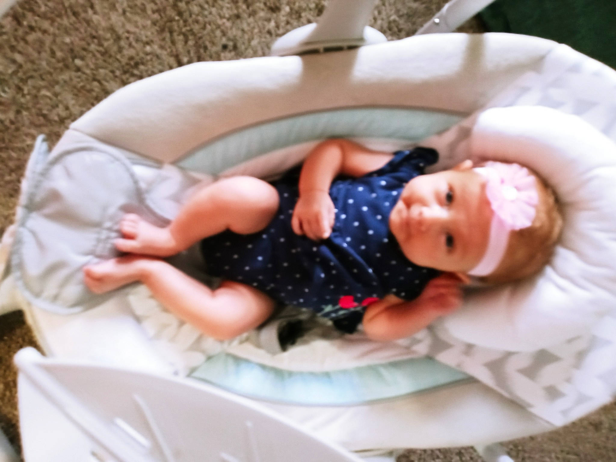 Stevie joined the competition — help win amazing prizes! arm, baby, baby_products, baby_safety, baby_sleeping, baby_toddler_clothing, child, comfort, doll, dress, hand, headwear, infant_bed, leg, linens, pattern, person, pink, sitting, sleeve