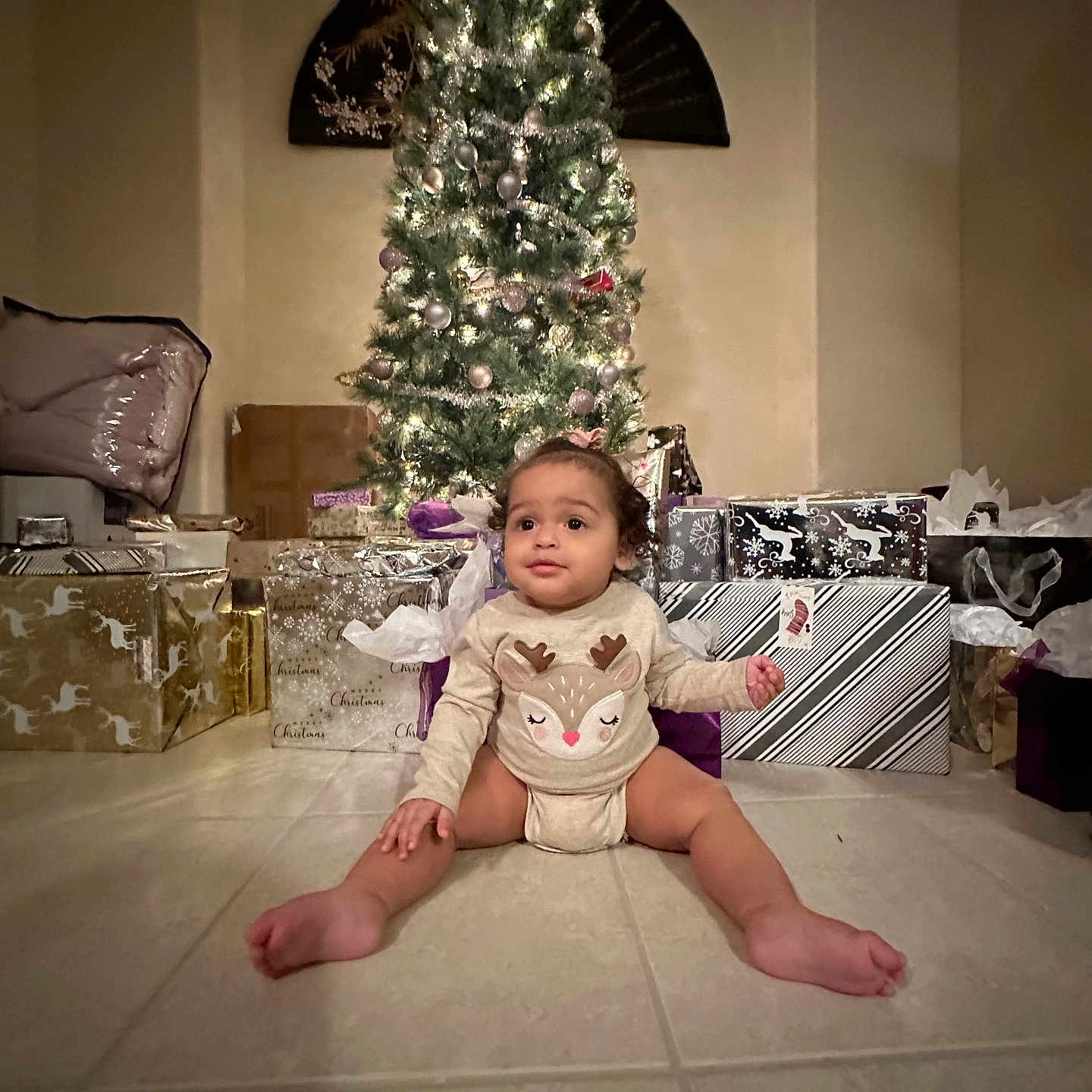 Zariah is registered to the contest to win money with this photo: accessories, architecture, baby, bag, barefoot, bed, bedroom, bodypart, box, building, chair, chandelier, christmas, christmasdecorations, christmastree, city, clothing, conifer, costume, couch