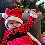 Joyce participe au concours pour gagner de l'argent avec cette photo : baby, blanket, bonnet, cap, chair, christmas, christmasdecorations, clothing, coat, doll, face, festival, furniture, hat, head, person, photography, portrait, sitting, toy