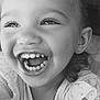 black_and_white, child, closeup, clothing, cute, earring, expression, eyes, face, hair, happy, joy, laughing, necklace, person, portrait, ruffles, smiling, teeth, toddler