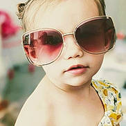 Joyce a rejoint le concours — aidez-le/la à gagner de superbes lots ! casual, child, closeup, cute, expression, eyewear, face, fashion, hair, indoor, light, person, portrait, skin, soft_focus, summer, sunglasses, toddler, yellow_dress, young_child
