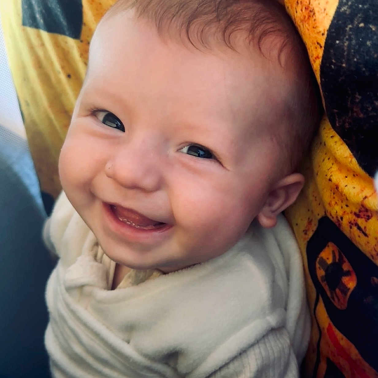 Walker is registered to the contest to win money with this photo: baby, babylaughing, banana, cushion, face, food, fruit, happy, head, homedecor, laughing, newborn, person, photography, plant, portrait, produce, smile