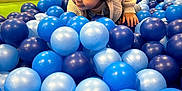 Reign is registered to the contest to win money with this photo: ball, balloon, bodypart, child, crawling, face, female, finger, football, girl, hand, head, indoorplayarea, indoors, inflatable, kindergarten, outdoorplayarea, outdoors, person, photography