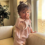 Reign joined the competition — help win amazing prizes! bodypart, child, clothing, couch, face, female, finger, furniture, girl, hand, happy, head, person, photography, plant, portrait, pottedplant, sitting, sleeve, smile