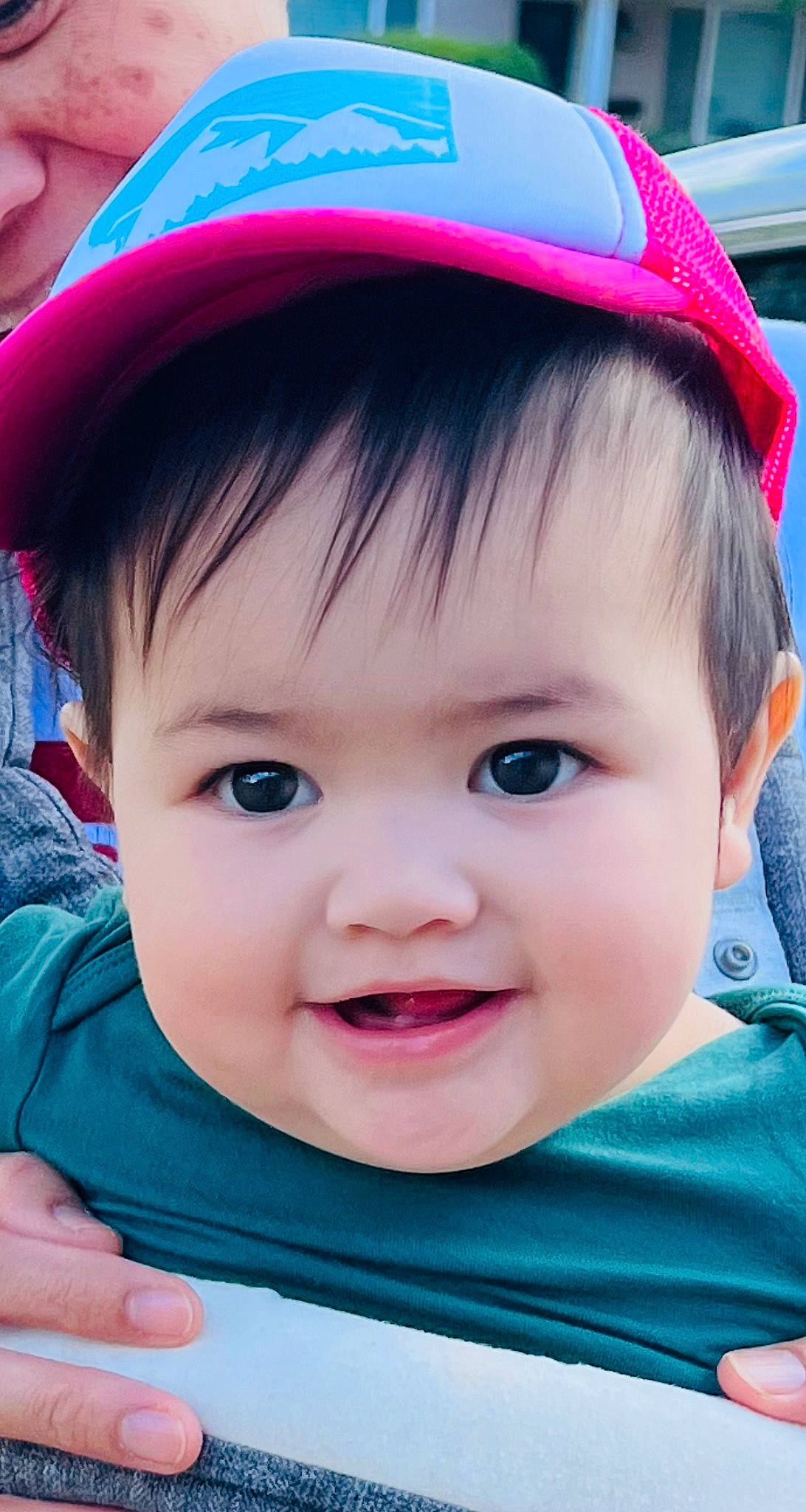 Mariella is registered to the contest to win money with this photo: blue, cap, cheek, chin, eye, eyebrow, eyelash, facial_expression, green, head, human, joy, lip, nose, organ, outerwear, person, photograph, product, skin