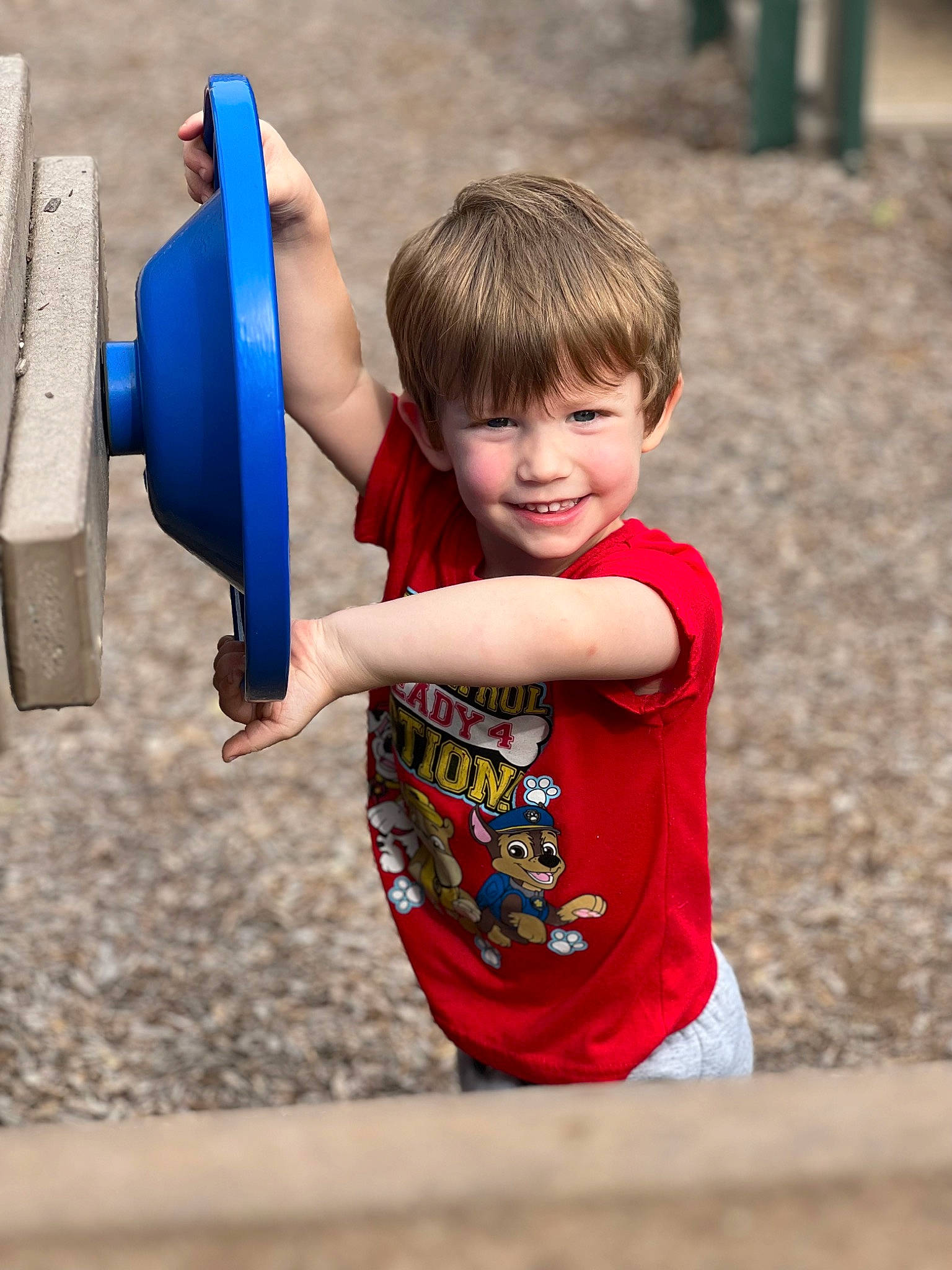 Jordan is registered to the contest to win money with this photo: child, city, elbow, electric_blue, facial_expression, fun, grass, hairstyle, happy, joy, leisure, mammal, outdoor_play_equipment, person, recreation, smile, soil, standing, t_shirt, toddler