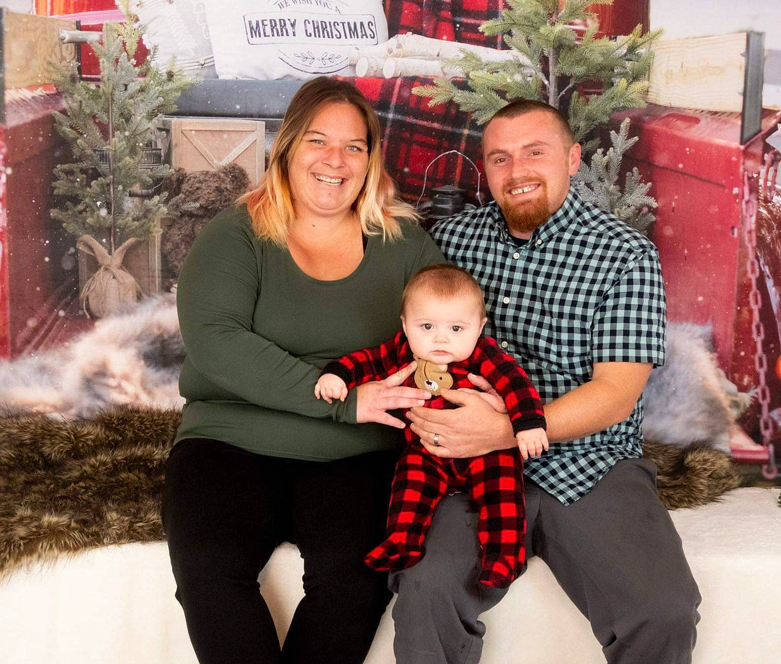 Cypress joined the competition — help win amazing prizes! baby, child, christmas, christmas_eve, comfort, event, family_taking_photos_together, fun, happy, holiday, joy, lap, organ, pattern, person, plaid, red, sitting, smile, tartan