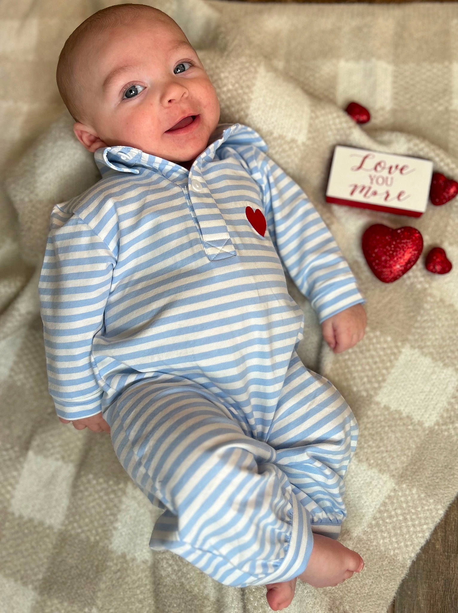 Jase joined the competition — help win amazing prizes! baby, baby_toddler_clothing, carmine, cheek, child, collar, comfort, face, facial_expression, happy, linens, pattern, person, portrait_photography, sitting, sleeve, smile, textile, toddler, white