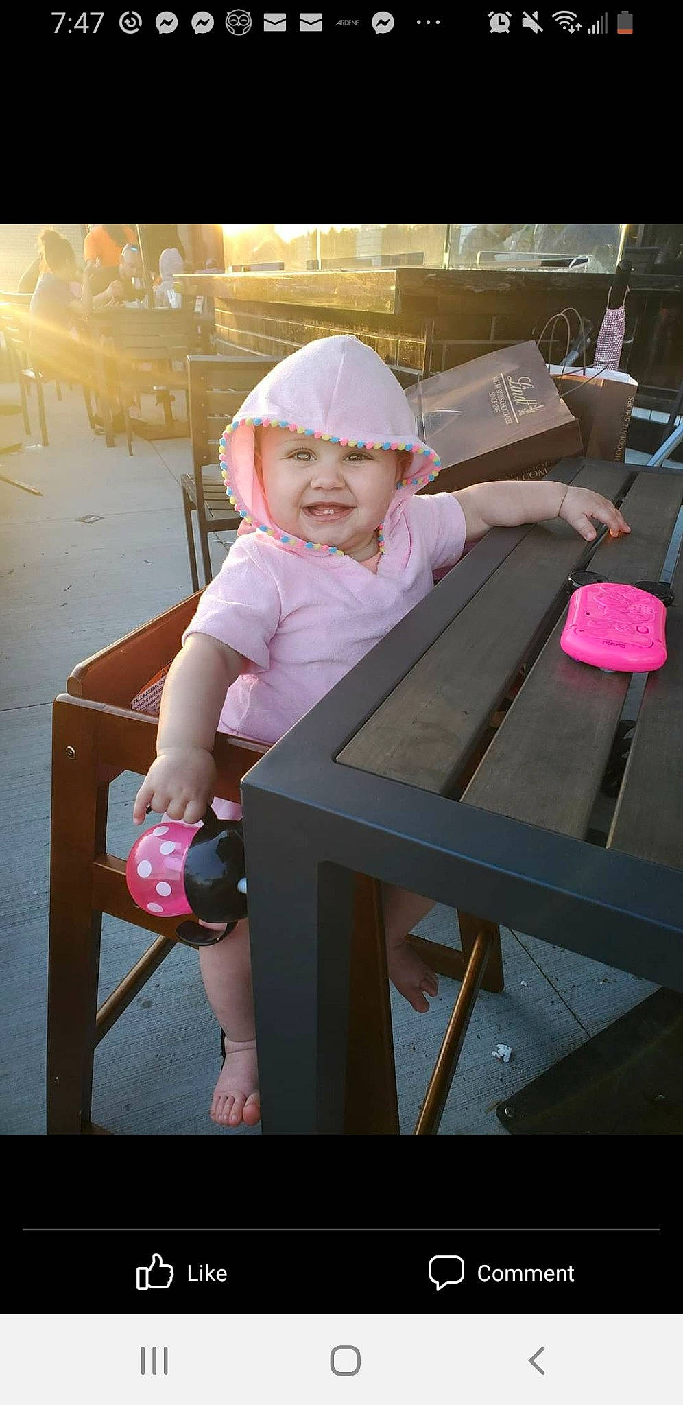Mileena is registered to the contest to win money with this photo: baby_toddler_clothing, baseball_cap, cap, child, fun, happy, hat, headgear, headwear, human_leg, leisure, magenta, person, pink, sandal, shorts, sitting, skin, standing, sun_hat