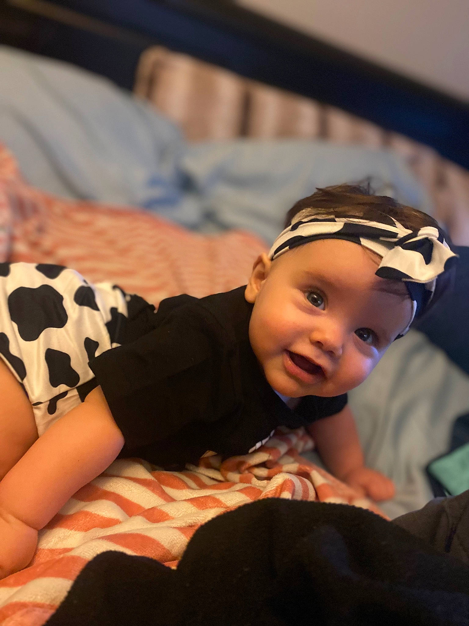 Maria joined the competition — help win amazing prizes! baby, baby_toddler_clothing, child, comfort, elbow, flash_photography, flooring, fun, happy, hat, headwear, human_body, human_leg, knee, pattern, person, plaid, sitting, smile, thigh