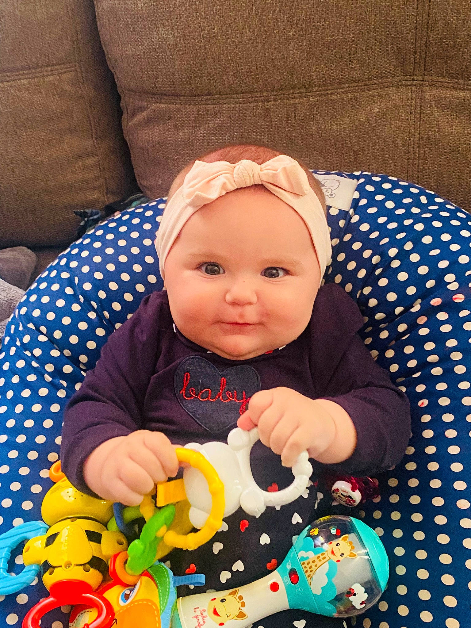 Rosalya participe au concours pour gagner de l'argent avec cette photo : baby, baby_playing_with_toys, baby_products, baby_sleeping, baby_toddler_clothing, baby_toys, cheek, child, comfort, happy, linens, outerwear, pattern, person, play, sitting, sleeve, smile, stuffed_toy, toddler