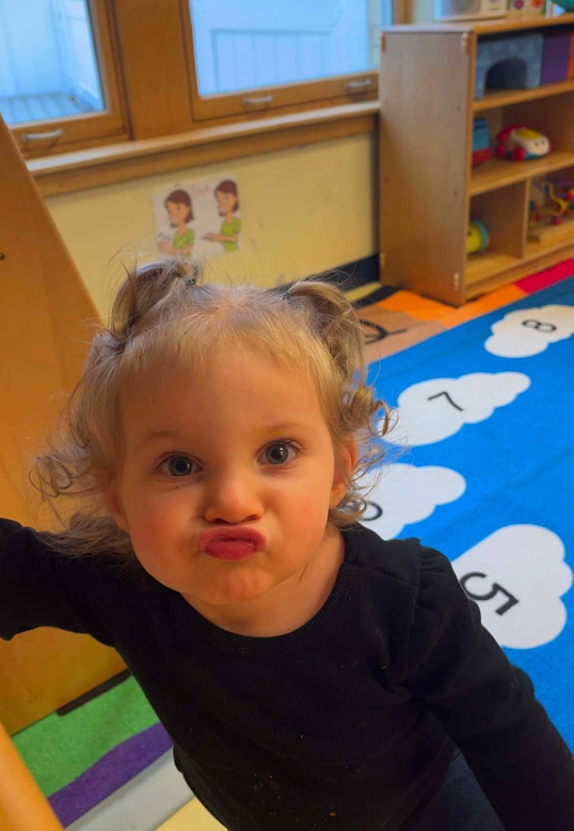 Alaska joined the competition — help win amazing prizes! baby, bookcase, cheek, child, floor, flooring, fun, happy, head, iris, leisure, nose, person, room, shelf, shelving, sitting, smile, snapshot, toddler