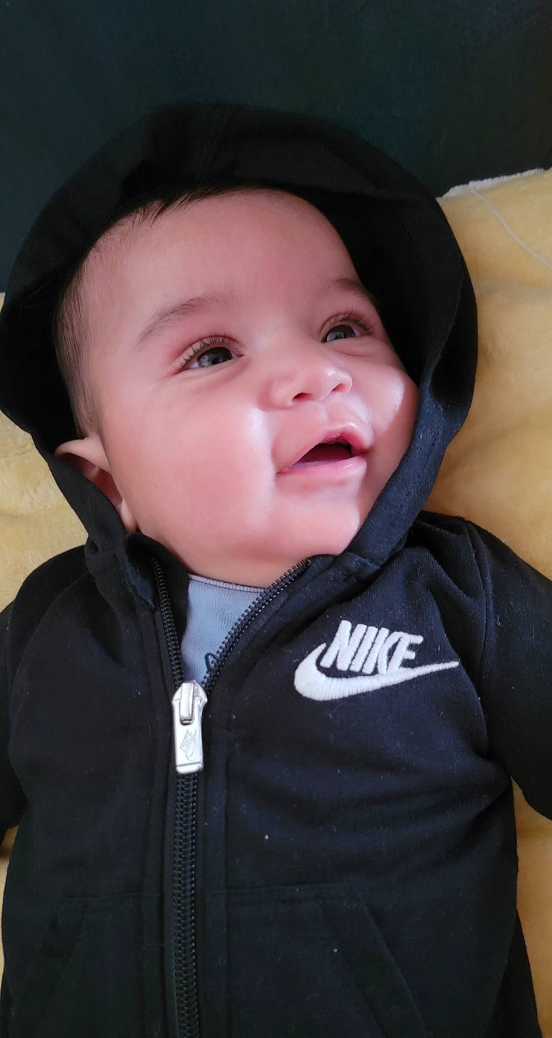 Alex is registered to the contest to win money with this photo: baby, baby_toddler_clothing, cheek, chin, eyebrow, facial_expression, flash_photography, gesture, happy, hat, headwear, iris, lip, mammal, nose, outerwear, person, product, skin, sleeve