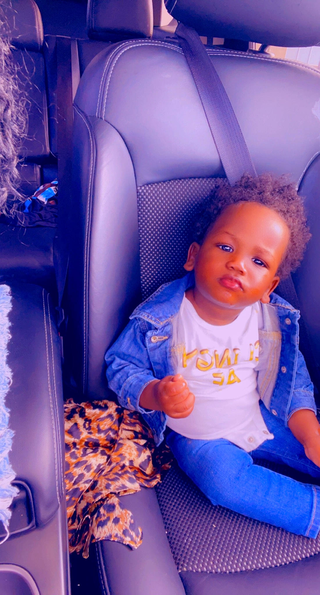 Kristopher is registered to the contest to win money with this photo: auto_part, automotive_design, baby_toddler_clothing, beauty, blue, car_seat, car_seat_cover, chair, child, comfort, electric_blue, fun, head_restraint, motor_vehicle, person, purple, sitting, tints_and_shades, toddler, vehicle