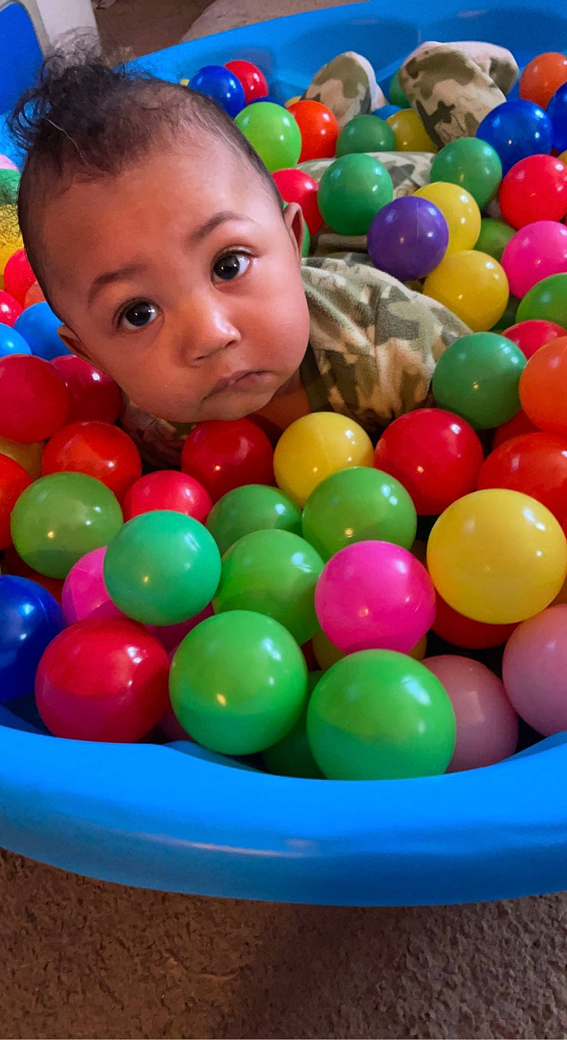 Cecil is registered to the contest to win money with this photo: ball, ball_pit, beauty, blue, child, event, fun, happy, human_settlement, leisure, person, photograph, play, playground, product, recreation, snapshot, surprise, sweetness, toddler