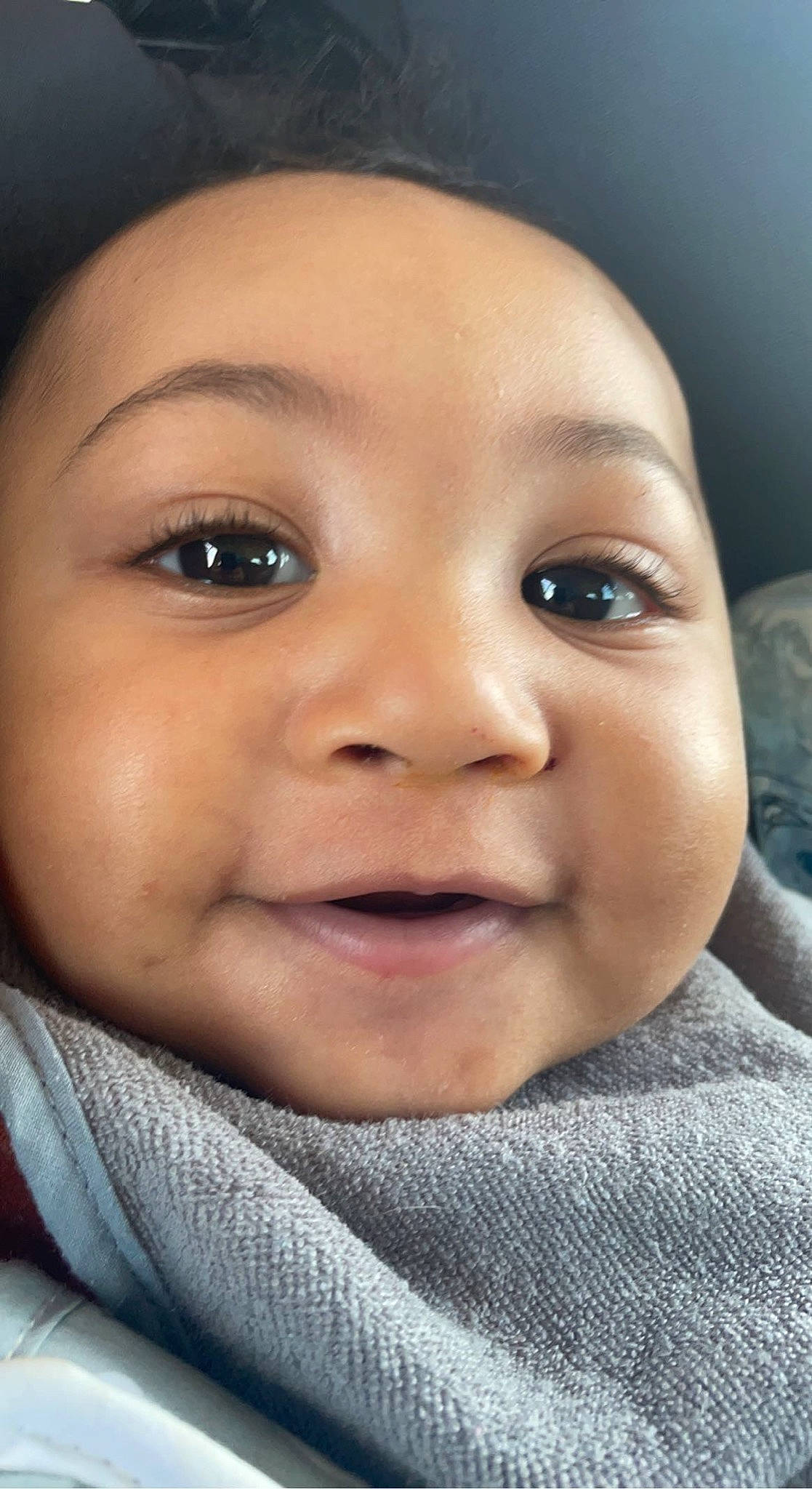 Cecil is registered to the contest to win money with this photo: baby, cheek, child, chin, ear, eyebrow, eyelash, flash_photography, forehead, gesture, happy, iris, jaw, lip, mouth, no_expression, nose, person, skin, smile