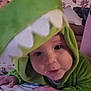 Aidan joined the competition — help win amazing prizes! baby, blanket, child, costume, curious, cushion, cute, dinosaur, face, green, hands, hood, indoors, pattern, person, portrait, soft, teeth, toddler, wallpaper