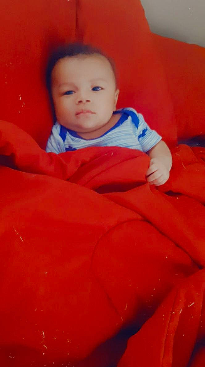 Halo joined the competition — help win amazing prizes! arm, baby, baby_toddler_clothing, cheek, chin, comfort, eye, eyebrow, face, finger, head, iris, mouth, neck, nose, orange, person, skin, sleeve, textile