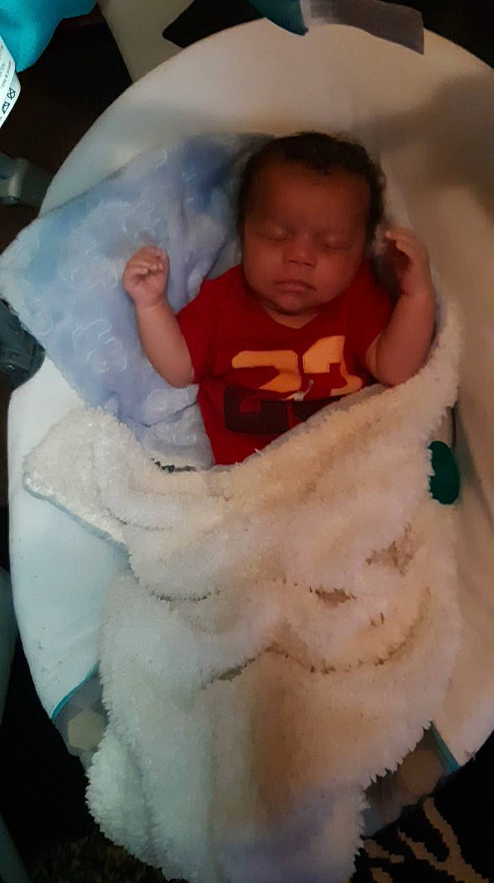 Halo is registered to the contest to win money with this photo: abdomen, baby, baby_products, baby_toddler_clothing, beauty, cheek, comfort, finger, hand, happy, head, linens, person, pink, sitting, skin, sleeve, thumb, toddler, trunk