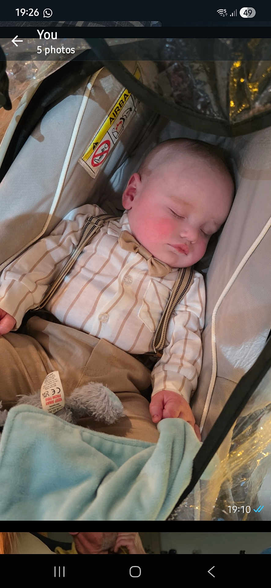 Gaberiel Samuel joined the competition — help win amazing prizes! baby, sleeping, stroller, striped_shirt, bow_tie, suspenders, blanket, plush_toy, child, infant, cute, peaceful, indoor, soft_lighting, portrait, relaxation, cozy, person, clothing, rest