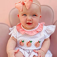 Charlee is registered to the contest to win money with this photo: baby, child, girl, headband, bow, pink, dress, sitting, cute, face, expression, indoor, portrait, clothing, infant, person, baby_girl, peach, seat, adorable
