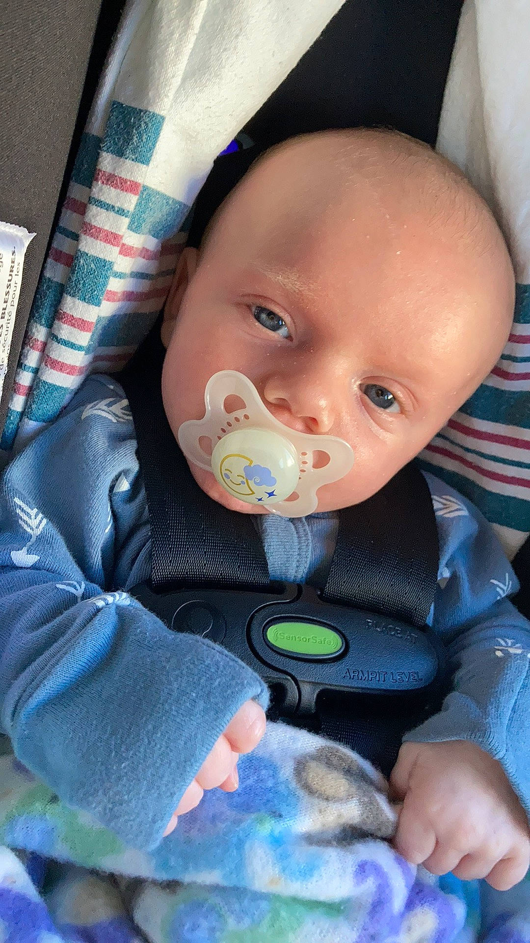 Levi joined the competition — help win amazing prizes! baby, baby_carriage, baby_safety, baby_toddler_clothing, cheek, chin, comfort, eye, eyelash, face, finger, iris, lip, mouth, nose, person, product, skin, sleeve, textile