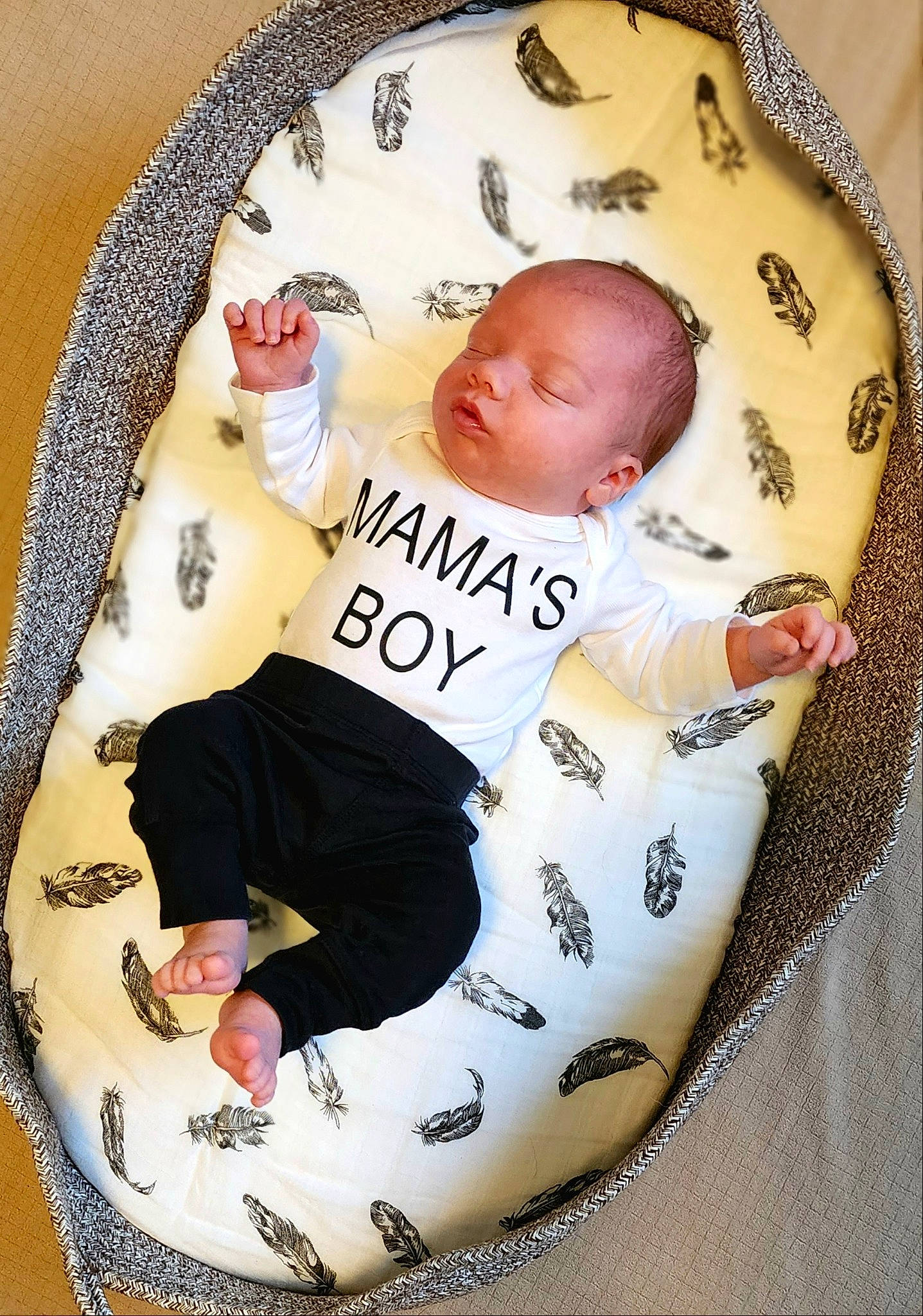 Evan is registered to the contest to win money with this photo: baby, baby_products, baby_sleeping, baby_toddler_clothing, child, circle, comfort, fashion_accessory, font, foot, hairstyle, knee, linens, pattern, person, sitting, sleeve, t_shirt, thigh, toddler