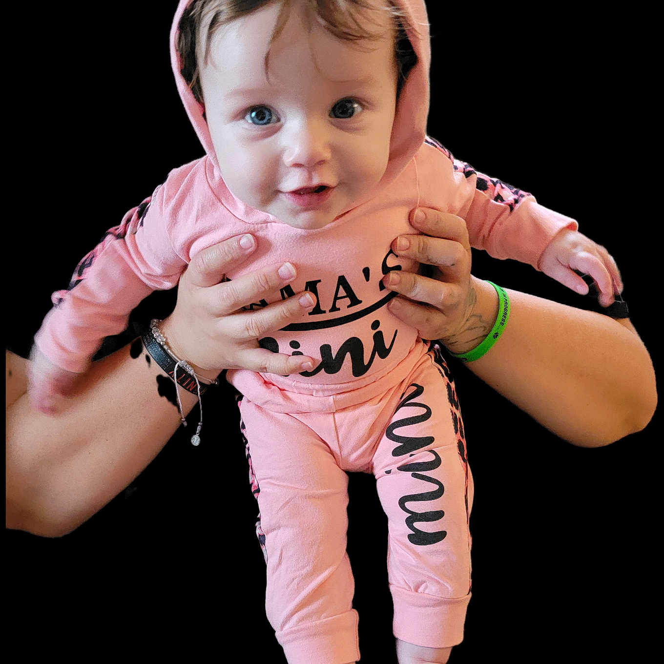 Romi joined the competition — help win amazing prizes! baby, barefoot, blue_eyes, casual_clothing, child, cute, expression, face, hands, holding, hoodie, human, infant, pants, person, pink_clothing, portrait, skin, smiling, young_child