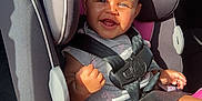 Leilanii joined the competition — help win amazing prizes! baby, car_seat, child, smiling, sunlight, car_interior, seatbelt, safety, infant, happy, clothing, headrest, window, shadow, seat, person, cute, young_child, transportation, portrait