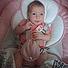 baby, infant, pink, pacifier, seat, cushion, blanket, clothing, child, person, indoors, comfortable, cute, straps, hand, face, smile, young, soft, resting