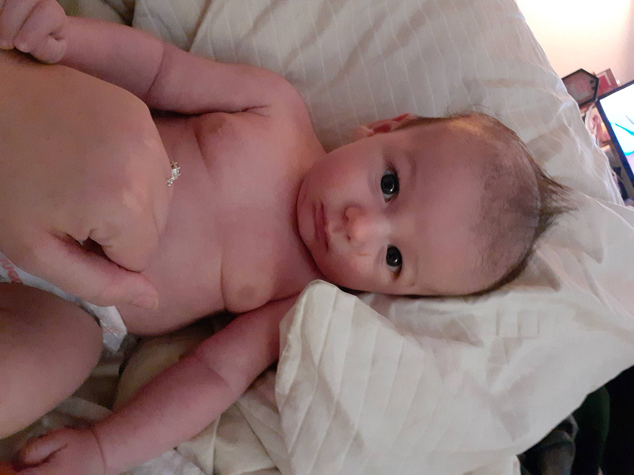 Wyatt is registered to the contest to win money with this photo: baby, baby_products, baby_safety, baby_toddler_clothing, cheek, child, comfort, eye, eyebrow, face, finger, head, iris, linens, lip, mouth, nose, person, skin, thumb