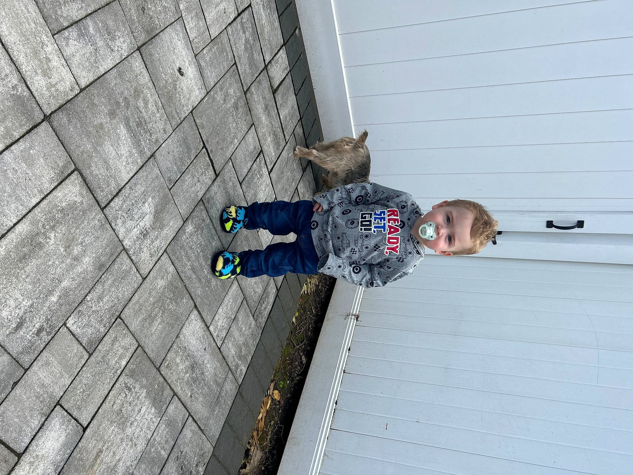 Kaleb joined the competition — help win amazing prizes! asphalt, cobblestone, composite_material, concrete, denim, electric_blue, flooring, outdoor_shoe, pattern, person, road_surface, sidewalk, toddler, walking_shoe, wood