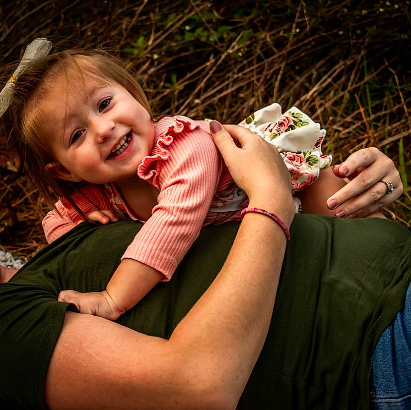 Joycelynn is registered to the contest to win money with this photo: arm, child, elbow, finger, flash_photography, fun, gesture, grass, grass_family, hand, happy, human_leg, joy, nail, people_in_nature, person, plant, skin, smile, thigh