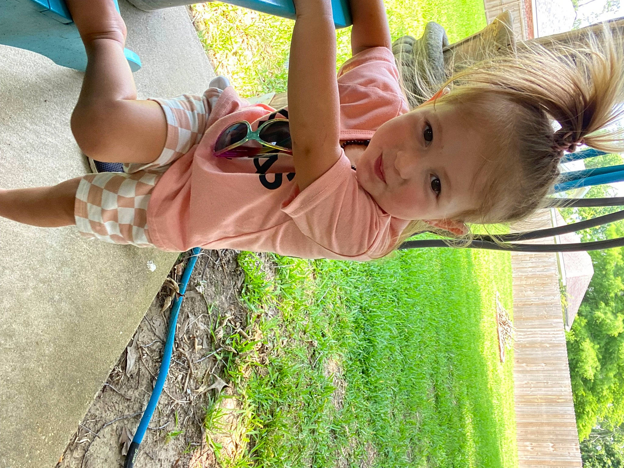 Joycelynn is registered to the contest to win money with this photo: baby, child, dress, fun, grass, green, happy, human_leg, joint, leisure, people, people_in_nature, person, plant, recreation, shorts, spring, sunlight, thigh, toddler