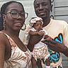 Annaliese joined the competition — help win amazing prizes! family, mother, father, baby, infant, people, outdoor, door, glasses, earrings, headwear, smile, holding, clothing, portrait, skin, hand, sleeveless, expression, casual