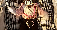 Annaliese joined the competition — help win amazing prizes! baby, infant, pacifier, blanket, crib, headband, bow, pink_clothing, black_pants, mittens, footwear, plush, patterned_blanket, cushion, sleeping_area, indoor, child, portrait, cozy, soft_lighting