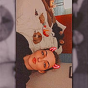 Taz Manian joined the competition — help win amazing prizes! woman, dog, bed, indoor, filter, red_horns, person, casual, relaxing, blanket, pillow, portrait, home, cozy, lighting, furniture, animal, pet, face, selfie
