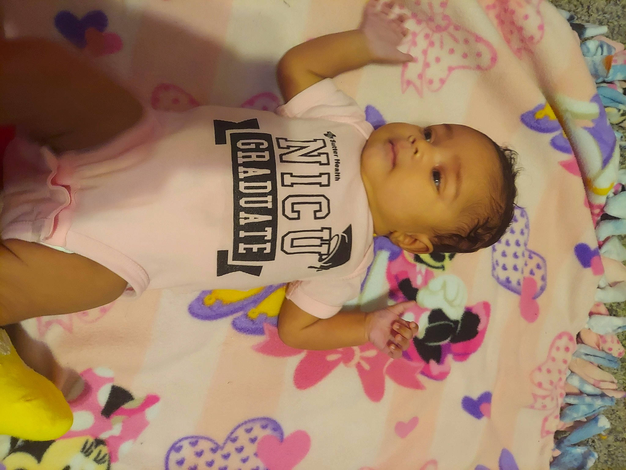 Amara joined the competition — help win amazing prizes! baby, baby_products, baby_toddler_clothing, cheek, child, face, finger, fun, happy, head, linens, pattern, person, pink, product, room, skin, sleeve, toddler, yellow