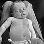 baby, sleeping, diaper, lap, person, skin, hair, peaceful, relaxed, infant, child, monochrome, black_and_white, portrait, casual, indoor, resting, cute, newborn, soft