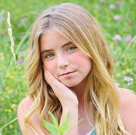 Josie Hughes joined the competition — help win amazing prizes! bangs, beauty, blond, brown_hair, chin, eyebrow, face, feathered_hair, grass, hair, hair_coloring, hairstyle, layered_hair, lip, long_hair, person, photography, skin, smile, step_cutting