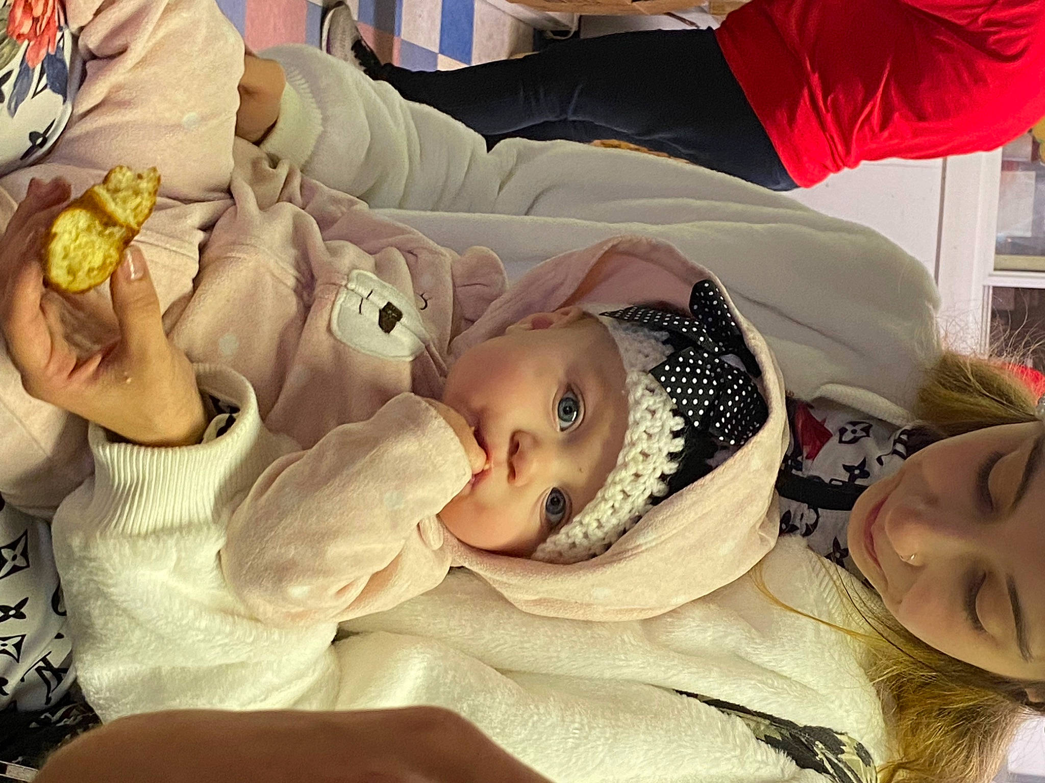 Ezmaria Bonafede is registered to the contest to win money with this photo: baby, baby_products, baby_toddler_clothing, cheek, child, comfort, event, fun, happy, hat, headwear, human_body, interaction, mouth, person, room, sitting, skin, smile, textile